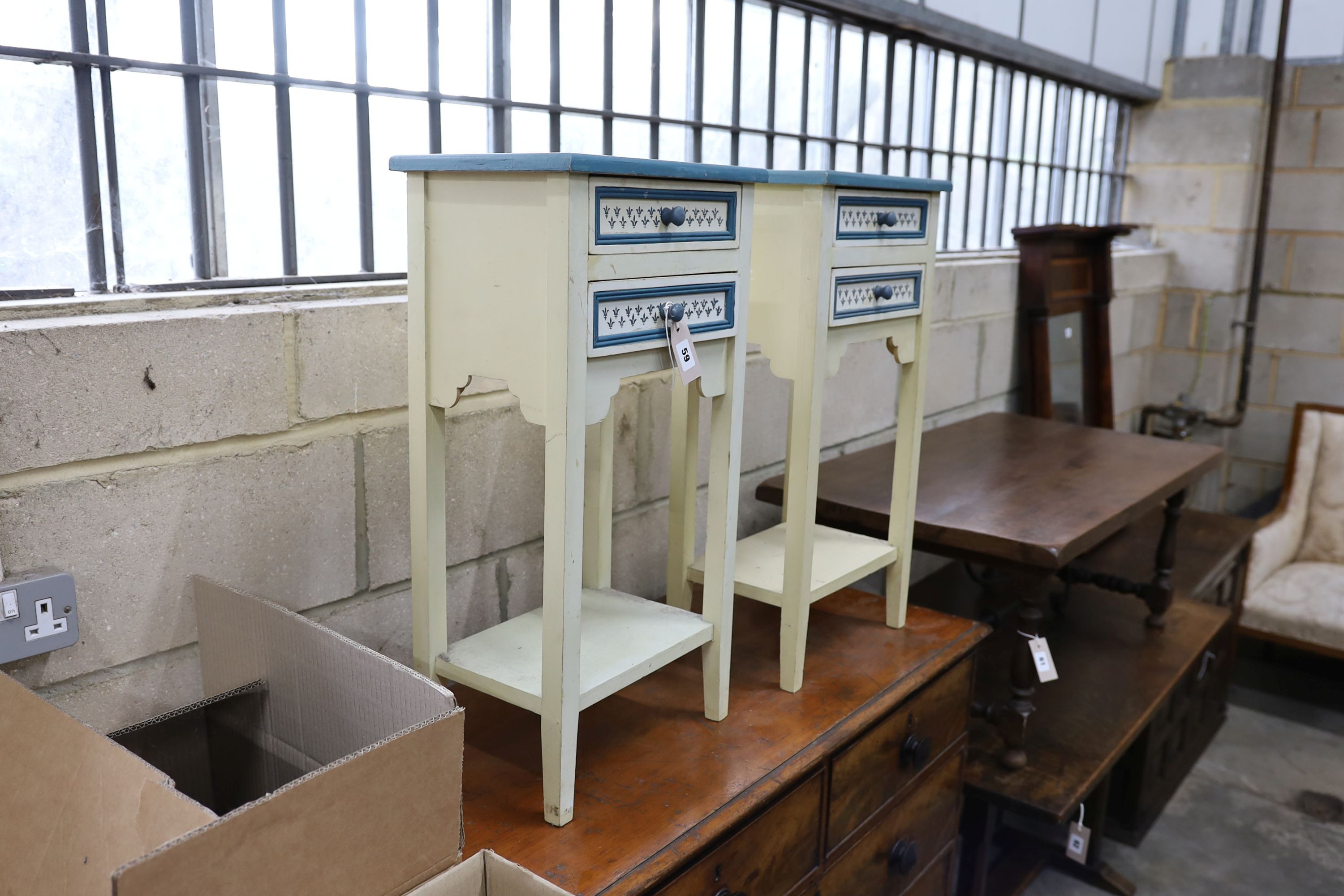 A pair of painted bedside chests, width 35cm, depth 25cm, height 69cm